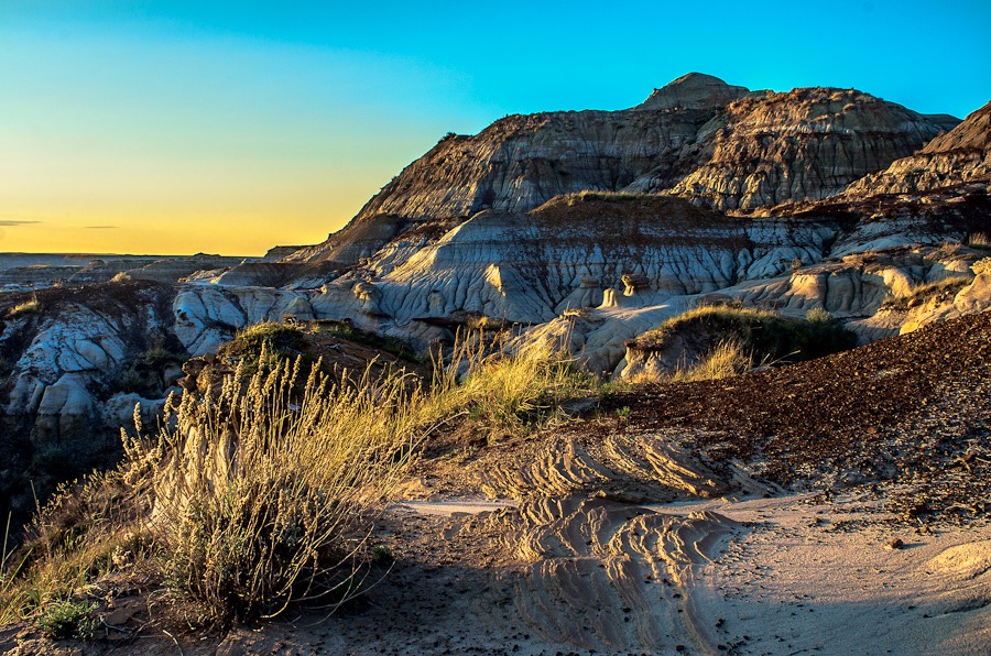 For Canadians suffering with travel itch, it's now time to plan a staycation and travel the world in Canada. We have homegrown options to compare to some of the greatest places in the world and this summer vacation will still be one to remember! badlands
