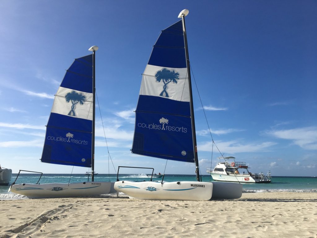 couples swept away negril, watersports, hobie cat