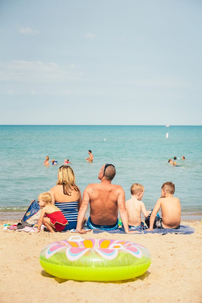 A family enjoying Grand Bend Beach