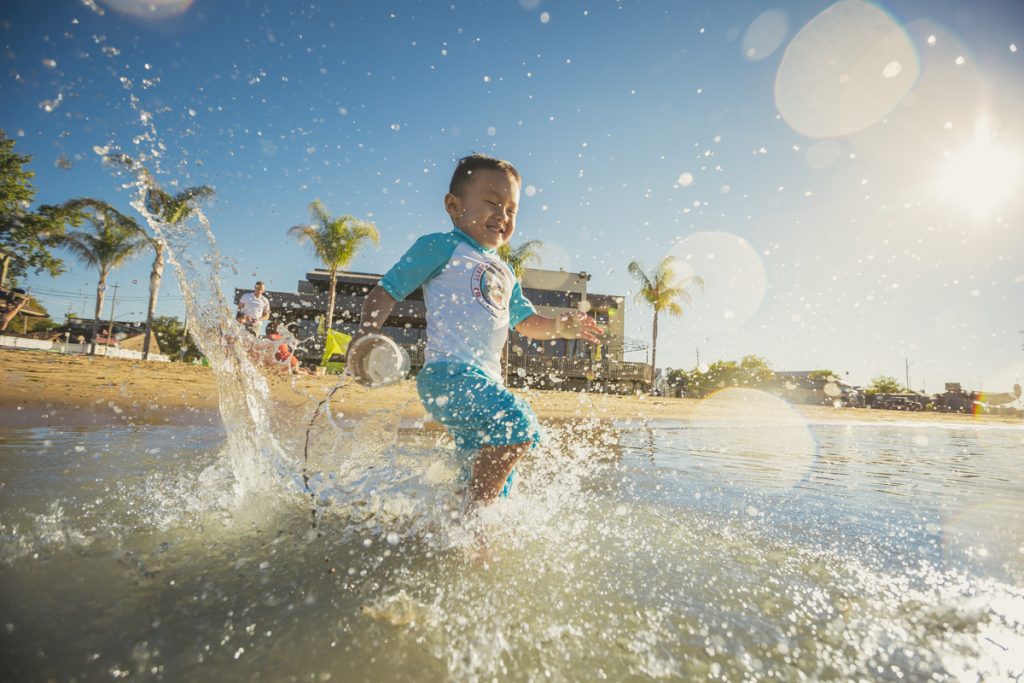 A child splashing in the water at Port Dover.