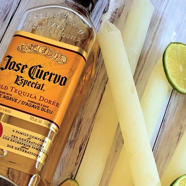 Homemade lime margarita freezies in plastic tubes