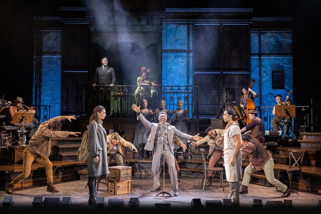 The Hadestown cast pulling the audience straight into the underworld with that wall of sound and energy.