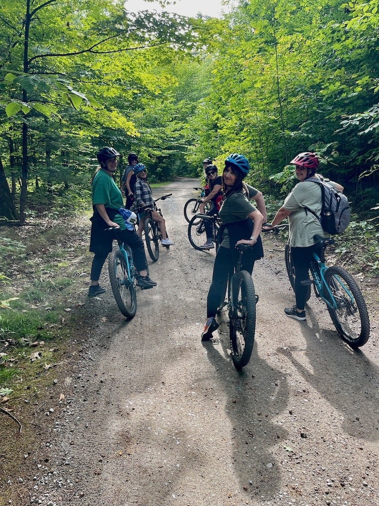 Biking through forest trails on Beausoleil Island in Georgian Bay.