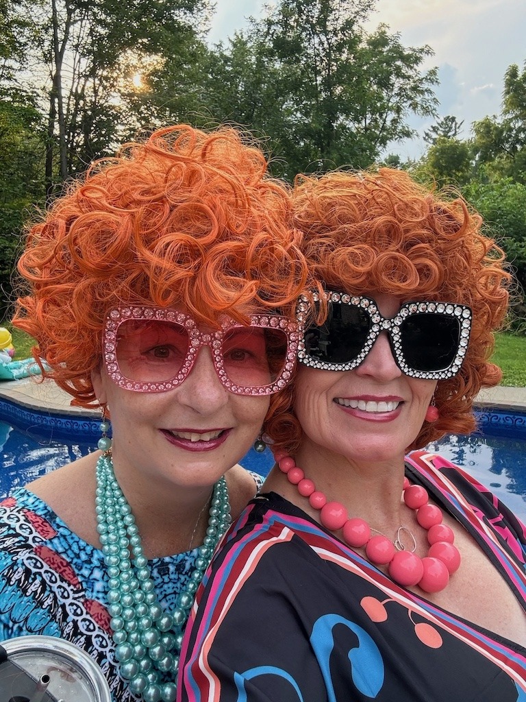 Wigs and big chunky jewelry is perfect for Mrs. Roper