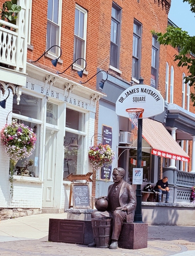 Statue of Dr. James Naismith with a basketball, in Almonte, Ontario.