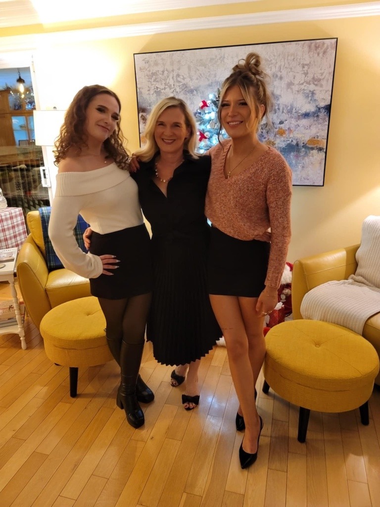 Gen X woman with her two daughters, raising the next generation of women who won't take any shit