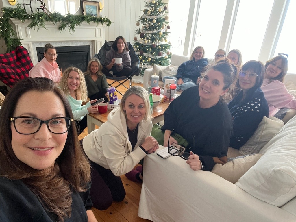 My friends and I relaxing together inside our rental home during a Crystal Beach Ontario winter girls weekend