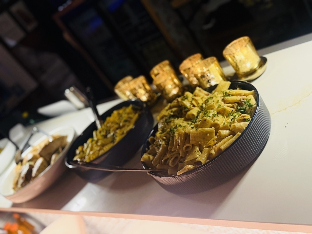 Candlelit pasta dishes prepared by Evermore Charcuterie for private dining event