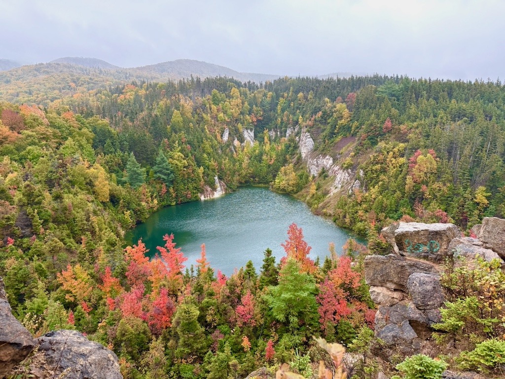 Aerial view of Gypsum Mine surrounded by autumn forest, the kind of real-world experience extinction of experience is erasing from our lives