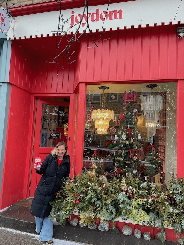 Shopping on Gore Street in Perth Ontario at Christmas outside Joydom boutique