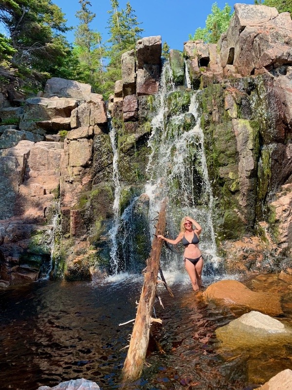 Woman standing in the pool at Black Brook