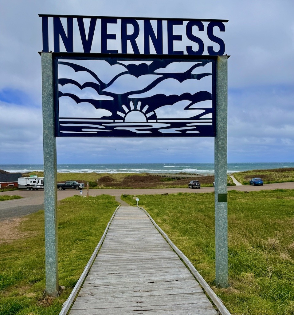 Inverness sign and boardwalk entrance to Inverness Beach Cape Breton